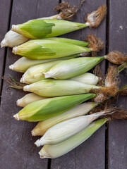 Obraz premium Harvested corn, close-up, husk, corn silk