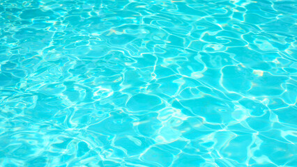 Swimming Pool Surface With Light Reflection and Water Ripple Patterns
