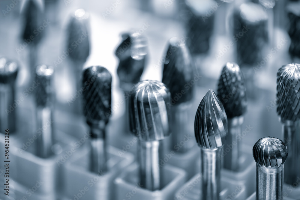 Aufkleber a collection of metal milling tools with a variety of shapes and sizes. concept of organization and 