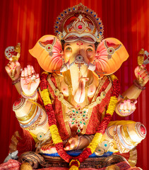 A Closeup shot Ganpati Installed in a Pandal during the 10 Day Ganesh Festival, the idols are immersed in heavy water bodies after the 10 days.