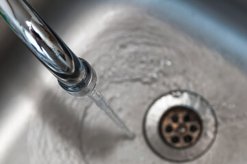 in the bathroom with running water