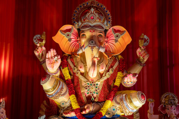 A Closeup shot Ganpati Installed in a Pandal during the 10 Day Ganesh Festival, the idols are immersed in heavy water bodies after the 10 days.