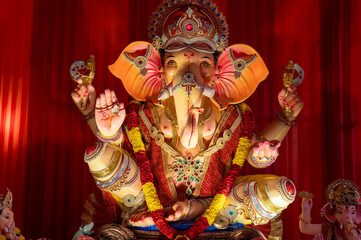 A Closeup shot Ganpati Installed in a Pandal during the 10 Day Ganesh Festival, the idols are immersed in heavy water bodies after the 10 days.
