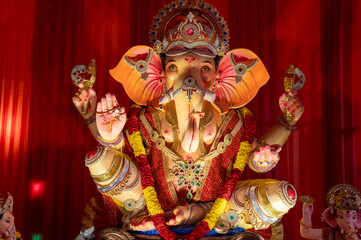 A Closeup shot Ganpati Installed in a Pandal during the 10 Day Ganesh Festival, the idols are immersed in heavy water bodies after the 10 days.