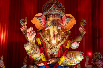 A Closeup shot Ganpati Installed in a Pandal during the 10 Day Ganesh Festival, the idols are...
