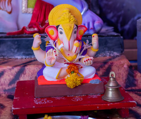 Fototapeta premium A Closeup shot Ganpati Installed in a Pandal during the 10 Day Ganesh Festival, the idols are immersed in heavy water bodies after the 10 days.