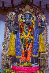 A Closeup shot Ganpati Installed in a Pandal during the 10 Day Ganesh Festival, the idols are immersed in heavy water bodies after the 10 days.