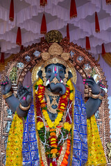 A Closeup shot Ganpati Installed in a Pandal during the 10 Day Ganesh Festival, the idols are immersed in heavy water bodies after the 10 days.