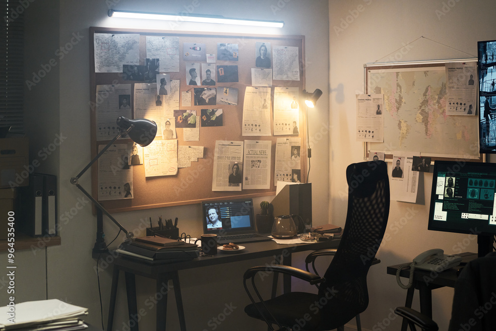 Aufkleber dark room with illuminated bulletin board covered with information and multiple screens displaying d