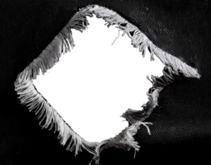 a cut-out hole with ragged edges in black fabric

