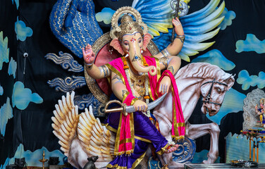 A Closeup shot Ganpati Installed in a Pandal during the 10 Day Ganesh Festival, the idols are immersed in heavy water bodies after the 10 days.