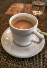 Cup of americano black coffee in restaurant cafe in Mexico.
