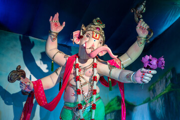 Fototapeta premium A Closeup shot Ganpati Installed in a Pandal during the 10 Day Ganesh Festival, the idols are immersed in heavy water bodies after the 10 days.