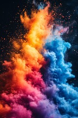 Vivid explosion of colorful smoke in shades of orange, pink, and blue against a dark background.