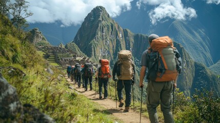 Obraz premium Machu Picchu as seen from the Inca Trail, with hikers approaching the ancient city.