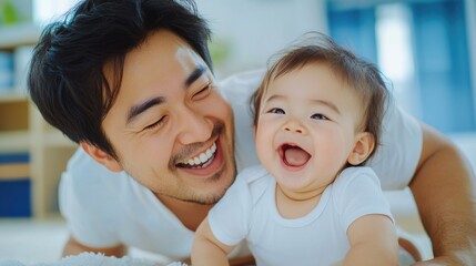 A man and a baby laying on the floor smiling, AI