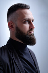 Fototapeta premium Studio portrait of young handsome man with beard.
