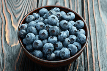 Blueberry photography in a bowl on rustic background