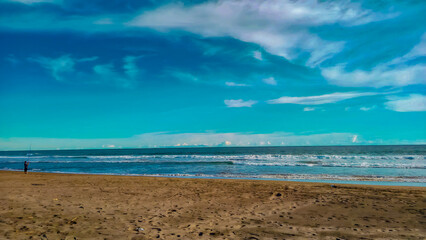 clouds over the beach