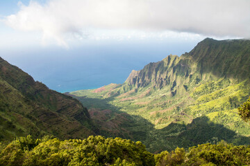 Na Pali valley and mountains on coast by ocean in Kauai, Hawaii