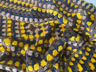 Crochet blanket handmade texture decor artistic background cozy worm photo 