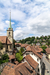 Typical building facade in downtown Bern Switzerland, with rooftops