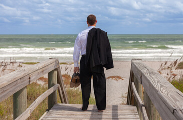 Businessman Man Wearing a Suit on a Beach Male Mental Health Concept