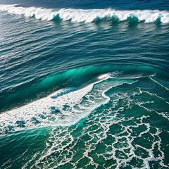 Fototapeta premium Aerial view beautiful of sea waves from drone. Stock image of blue color of ocean water, sea surface. Top view on turquoise waves, clear water surface texture. 