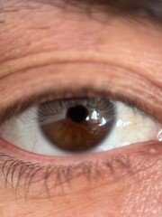 a man brown light eyes