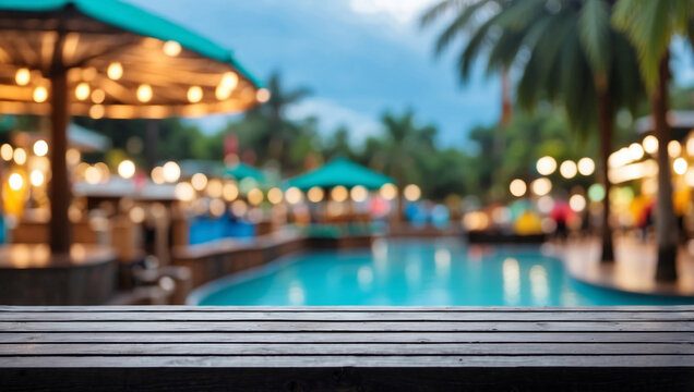 The empty black wooden table top with blur background of water park. For product display