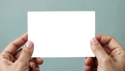 A man holding a blank white card in both hands against a neutral gray background, ready for any message, note, image, perfect for various creative uses. Transparent, PNG. 