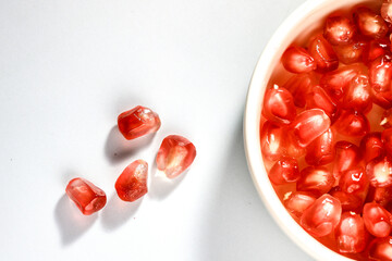 pomegranate seeds in a bowl