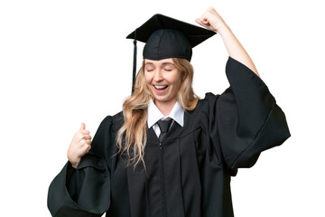 Young university English graduate woman over isolated background celebrating a victory