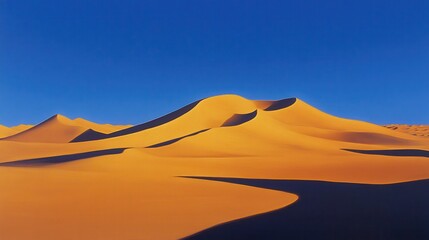 Golden desert dunes with dramatic shadows, stretching endlessly under a deep blue sky