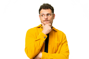 Brazilian man over isolated chroma key background having doubts and thinking