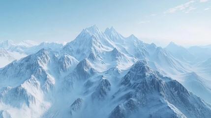Obraz premium Aerial view of a rugged mountain range covered in snow, with dramatic peaks rising into a clear blue sky