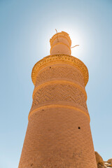 An adobe shaking minaret in Kharanagh castle, an ancient village near Yazd, Iran.  