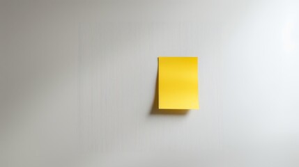 Yellow sticky notes arranged randomly on white surface