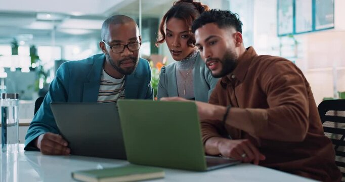 Laptop, business people and smile in office for advice, marketing comparison and positive review. Team, technology and discussion at table for stock analogy, explaining and happy for understanding