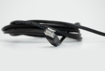 close up of black network cable. Twisted-pair cable