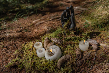 Halloween atmosphere and magical rituals in the middle of the forest with cadaverous hand and...