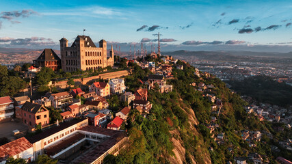 Naklejka premium Aerial view of Antananarivo at sunset highlighting the cityscape and surrounding hills