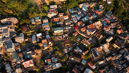 Aerial view of Antananarivo at sunset showcasing colorful rooftops and vibrant urban life in Madagascar