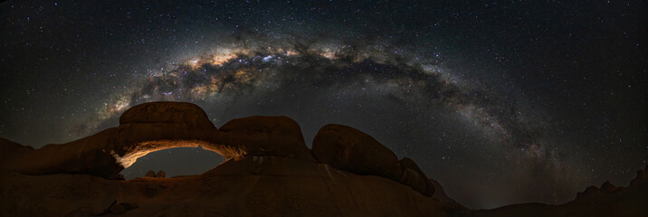 Milky Way over the natural bridge arch in Spitzkoppe, Namibia