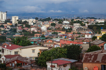 Authentic houses showcasing the unique architecture of Antananarivo, Madagascar under a cloudy sky