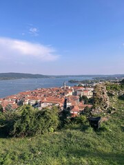 view of a small town near the lake in Italy