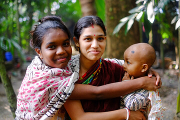 South asian rural family members are holding each other with happiness 