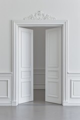 A simple, empty white room with one open door