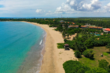 Aerial view of beach, ocean and hotels in Pasikuda, Sri Lanka