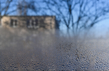 Fototapeta premium condensation from water droplets on the window glass